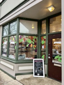 Outside shot of the front of a store - Mindo Chocolate Makers - on 4th Street in downtown Ann Arbor, Michigan