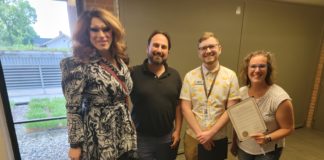 Jaedin Black, furthest left; Joe Halsch, President of the Jim Toy Center, center-left; Sean Reynolds, center-right; and Naomi Goldberg, furthers left; moments after Taylor made his declaration on June 5.