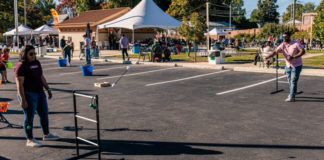 Kid plays games at Backyard Beer Garden in 2022.