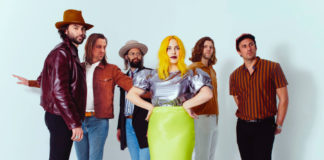 a group of people posing for a picture.