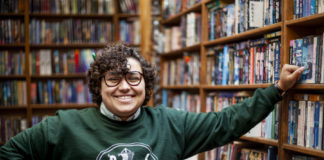 Person standing in Library.