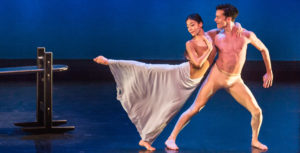 2 actors performing in a play.