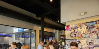 People eating inside Hola Seoul.