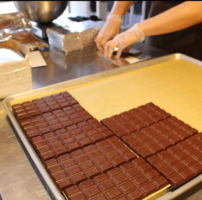 IMG_9826 A photo of chocolate bars being made.