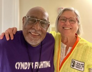 Two people smiling for a picture.