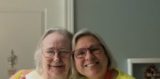 Two people smiling for a picture/