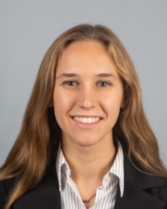 A professional portrait of a person.