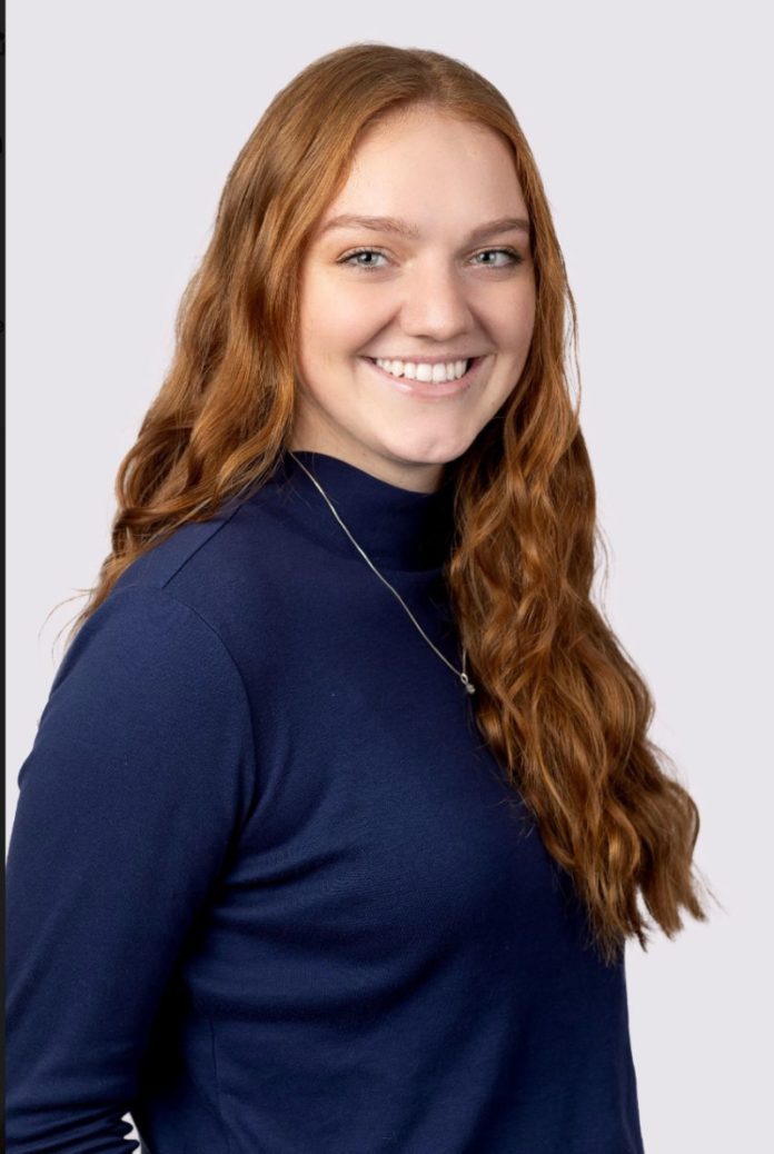 Professional headshot of a employee.