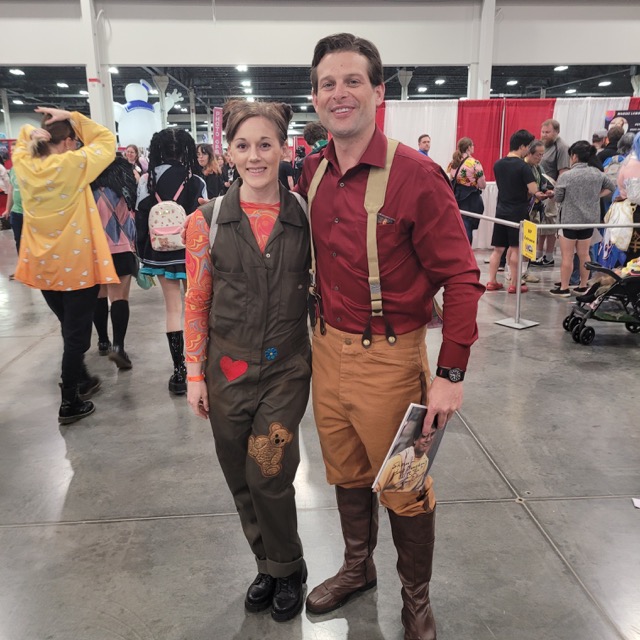 Two people at ComicCon taking a picture.