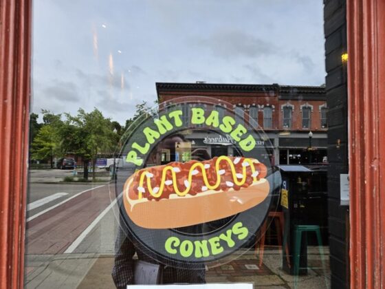 A "plant based coneys" sign.