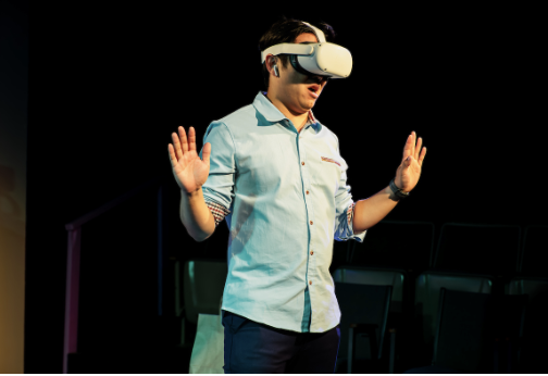 Screenshot 2024-07-19 at 11.17.13 AM A person wearing a VR headset.