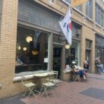 5.) South Korea flag flying outside Comet Cafe in the Arcade.