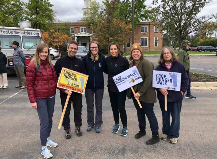Group holding signs