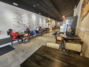 tables and chairs inside cafe