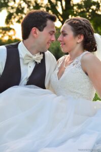 Bride and groom looking into eachother's eyes