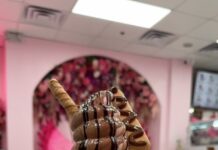 Chimney cake against pink background