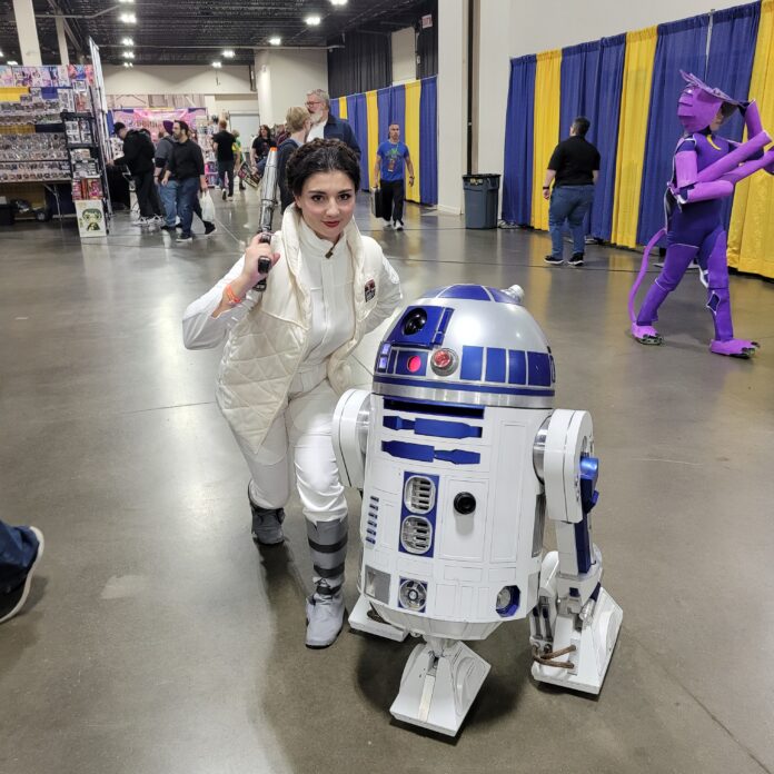 Princess Leia and R2-D2 cosplay