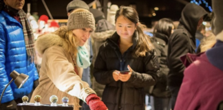 Two women shopping at craft fair