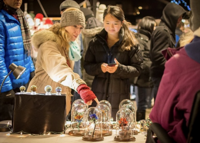 Two women shopping at craft fair