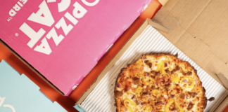 Pizza, pizza boxes and soda can