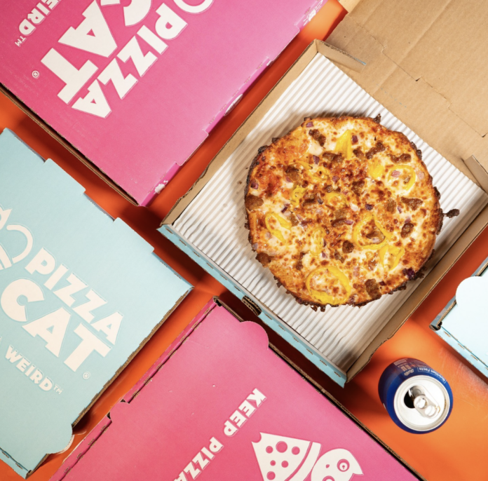 Pizza, pizza boxes and soda can