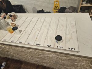 A slot system where finished orders are organized by the name you put with the order.