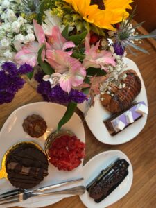 flowers bext to baked goods 