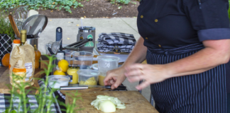 Person cooking on cutting board