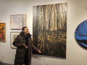 Helen Gotlib with her piece at the WSG's 14+14 show