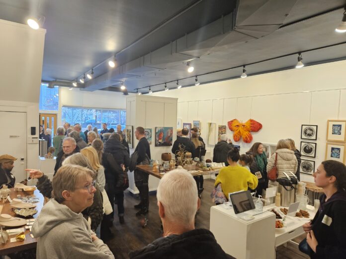 The crowd at the Guild of Artisan's show Anything Goes. Photo by Drew Saunders.