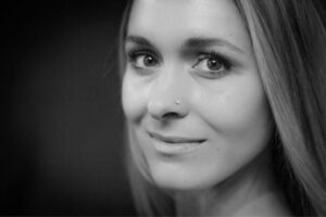 Black and white headshot of woman