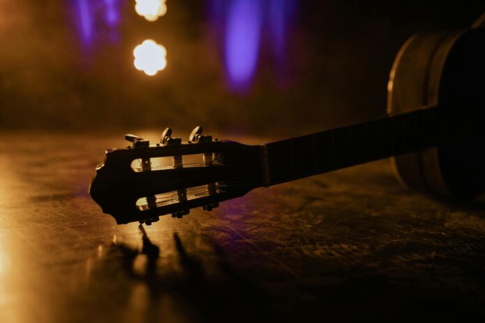 Up close of guitar on stage