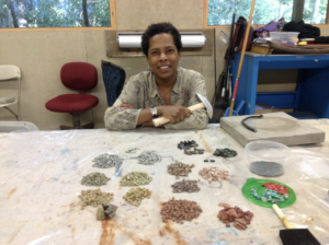  The artist Wasentha Young with her artistic materials.