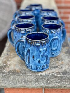 Anthony DeNardis' license plate mugs.