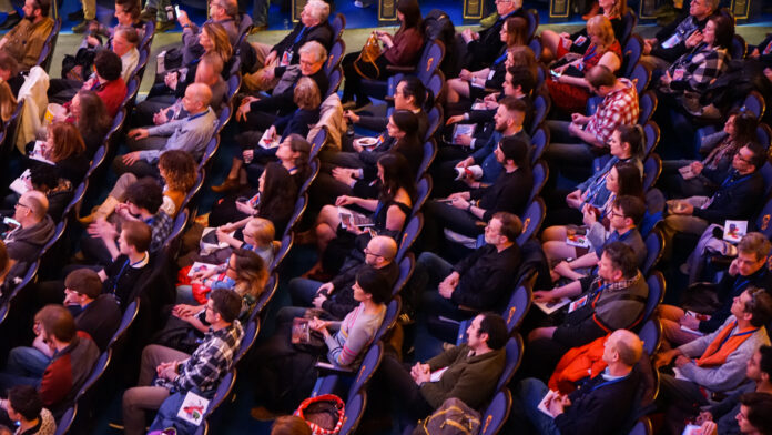 theater-goers in seats