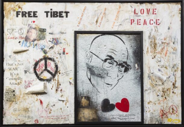 This mixed media painting has a graffiti aesthetic. There are a series of portraits, one large in spray paint in the center of the work and a number of smaller ones in collaged newspaper. Throughout the composition are stenciled phrases in black and red paint as well as inscribed phrases in pen and various colored paints. There are also a number collaged pieces of newspaper. The work is signed and dated (l.r.) "B Dogancay / 2009" in yellow paint.