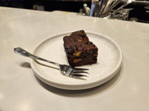The excellent raspberry and pistachio brownie from Curious Coffee. Photo by Drew Saunders.