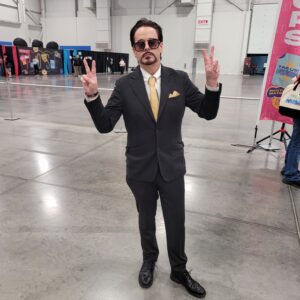 A cosplayers dresses up as Tony Stark, alter-ego of Iron Man.