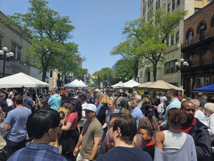 The whole point of Taste of Ann Arbor is to get as many people as possible to downtown's restaurants. This sea of humanity was the result. Photo by Drew Saunders.