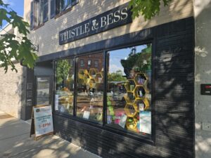 Thistle & Bess with balloons in front of it. Photo by Drew Saunders