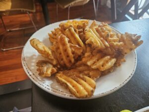 The waffle fries at Coratti's Pizzeria. Photo by Drew Saunders.