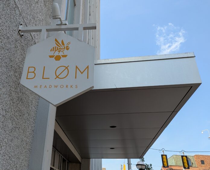 Bløm Mead + Cider's sign outside their 4th Street location.