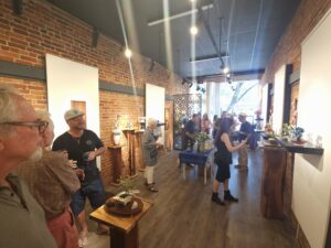 Chris Nordin's art gallery during the August 15 opening reception of Above Bonsai.