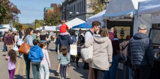 Artoberfest ann arbor art fair oktoberfest crowd with pop-ups in street