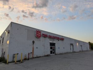 White building with "Salvation Army" sign on the front.
