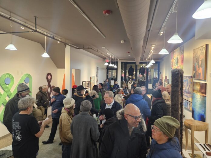 The opening recenption of “Artists and Their Teachers: the Power of Mentorship in the Transfer of Ideas” in the former CultureVerse gallery on Dec. 5. Photo by Drew Saunders.