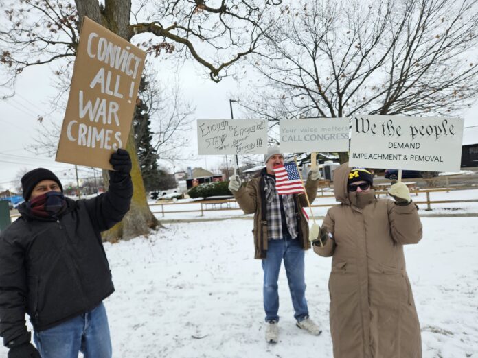 Protestors in Ann Arbor against the Trump Administration's attack on Caracas. Photo by Drew Saunders.