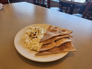 Eggplant salad comes with pita at Ayse's. Photo by Drew Saunders.