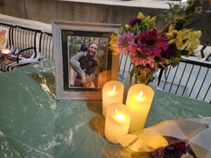 A Alex Pretti vigil table in Ann Arbor. Photo by Drew Saunders.
