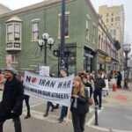 A2 Against Ice took Sunday's protest past Literati. Photo by Drew Saunders.